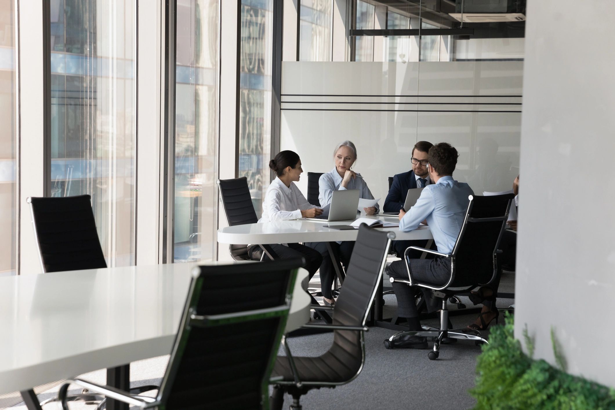 Business technology consultants meeting to review cloud strategy