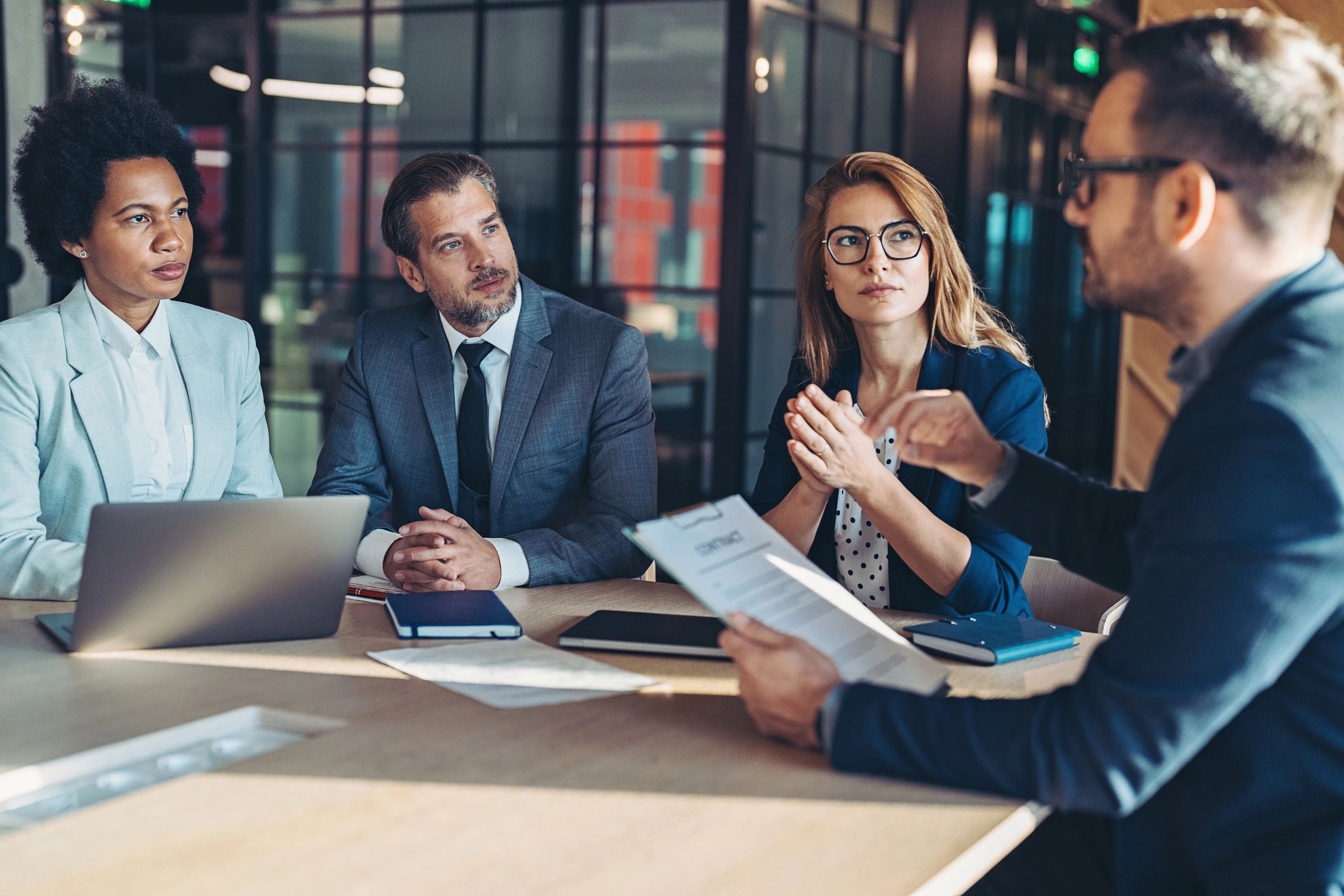 Business presenter leading a technology strategy discussion in a conference room