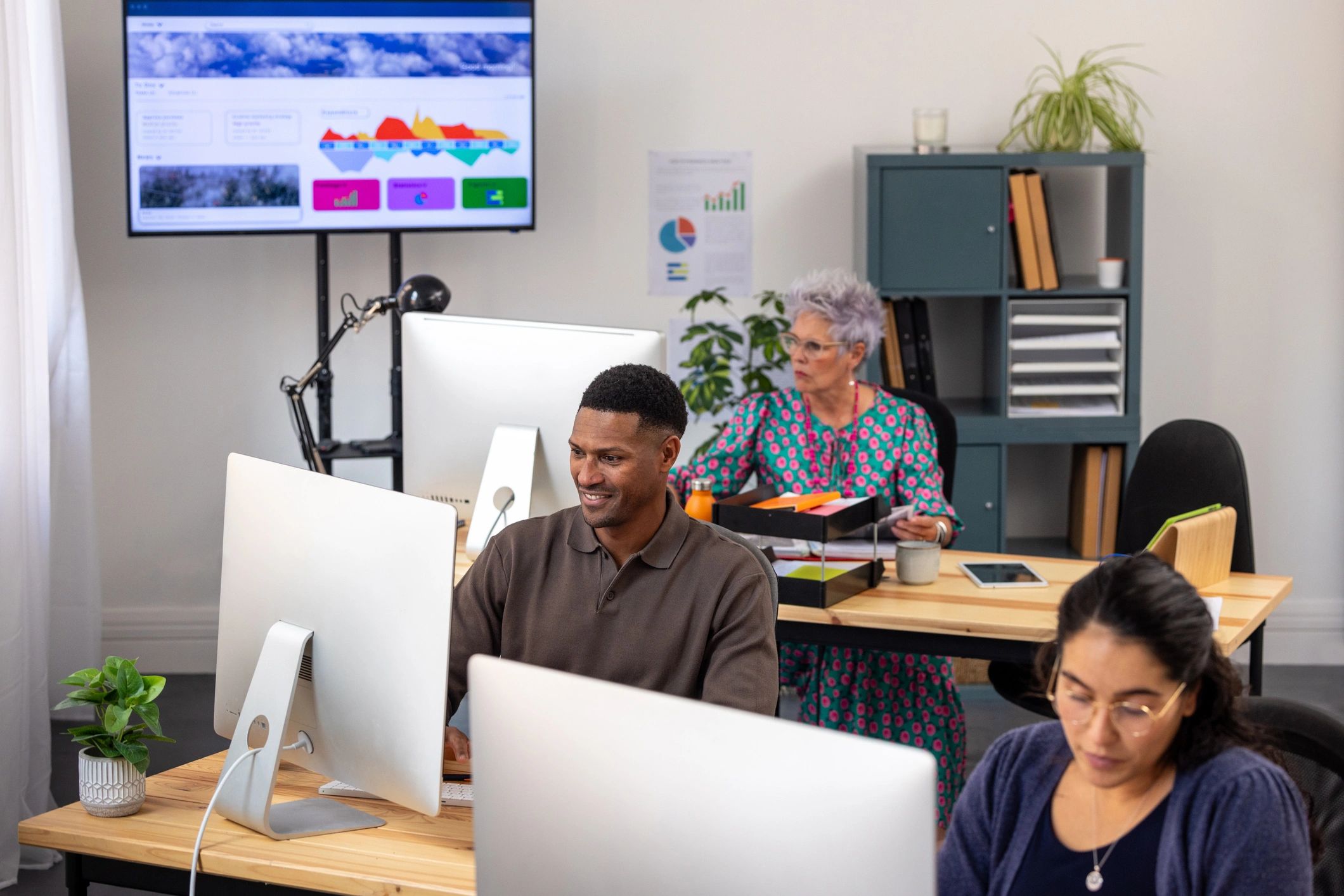 Technology operations team working in a modern office