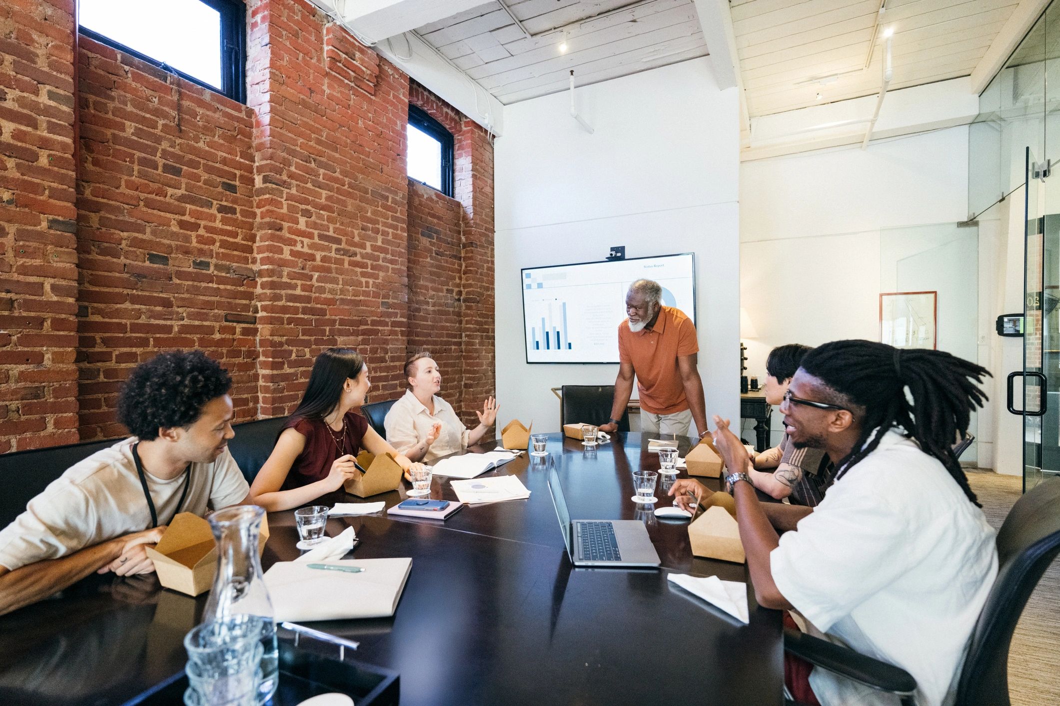 Business technology consultants meeting in a boardroom