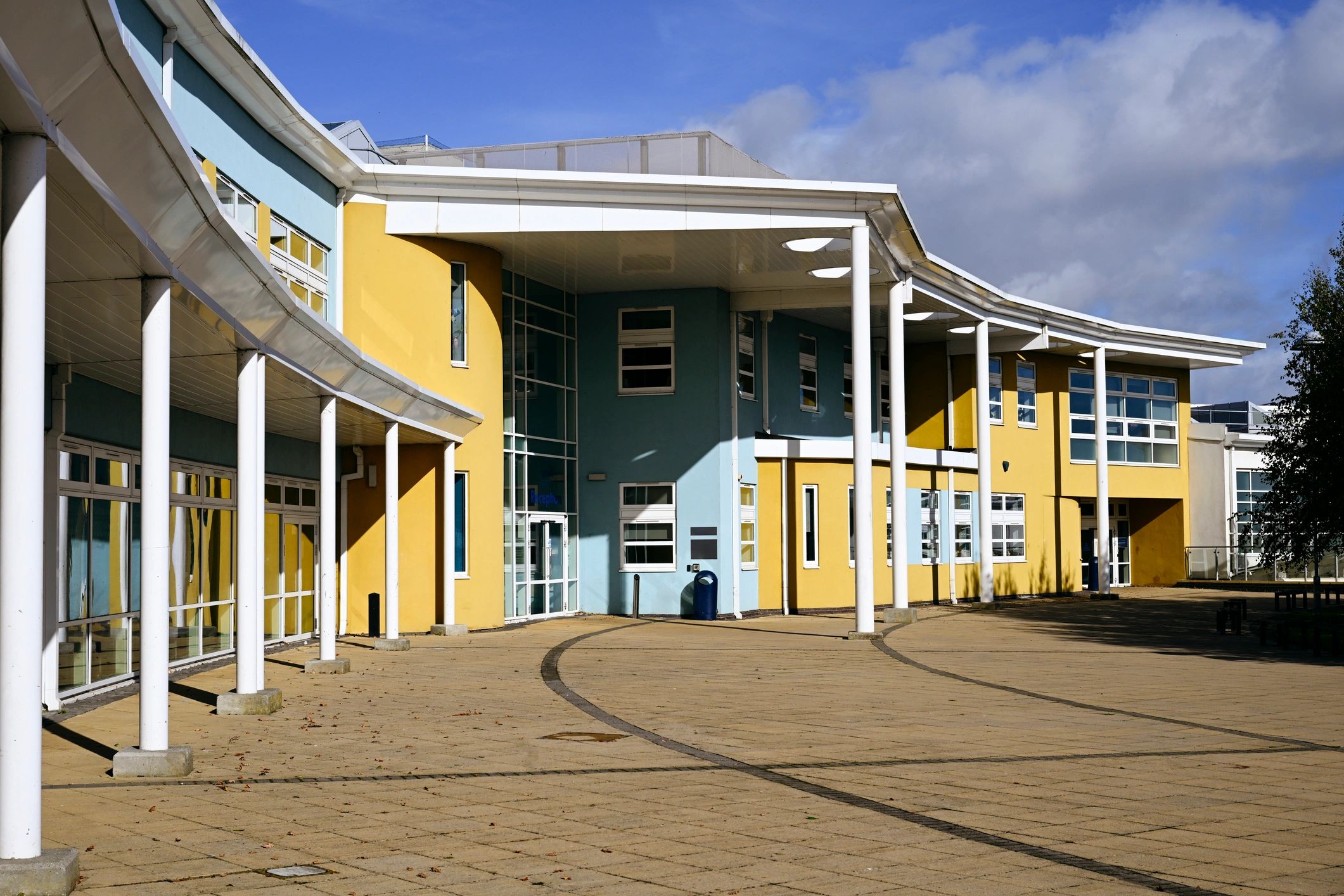 Commercial building exterior representing controlled facility access